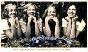 Beth, Cindy, Becky & Teresa look over just a few of their ribbons